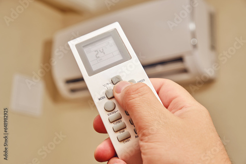 Foto Air conditioner climate control equipment maintains a comfortable condition in the office all year round