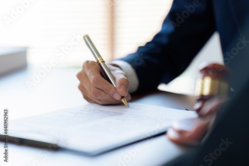Businessman and lawyer discuss the contract document. Treaty of the law. Sign a contract business