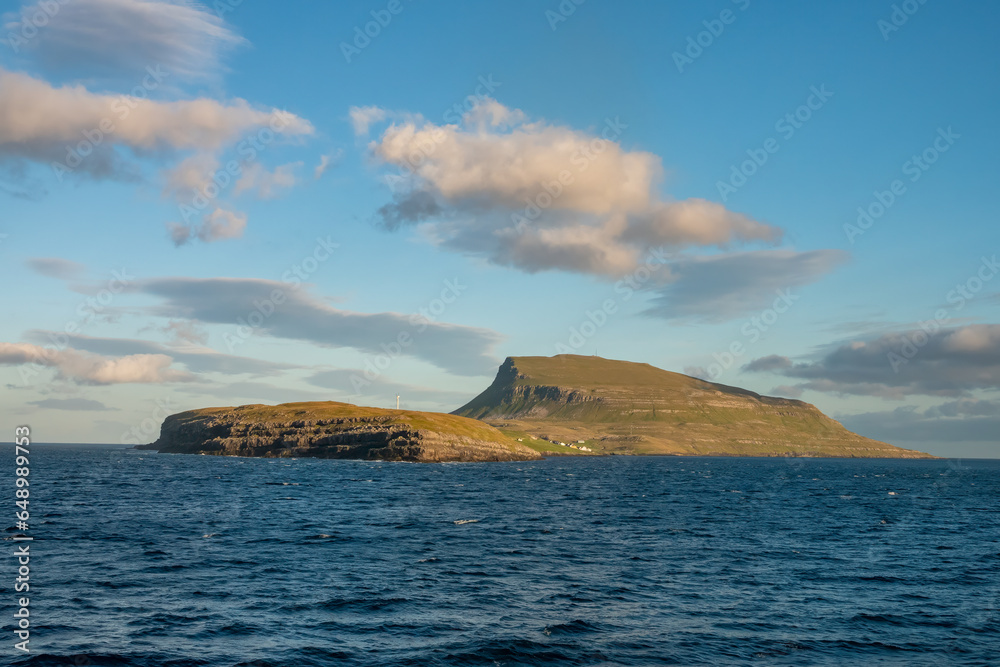 Sailing past Nolsoy Island, Faroe Islands, a self-governing archipelago, part of the Kingdom of Denmark