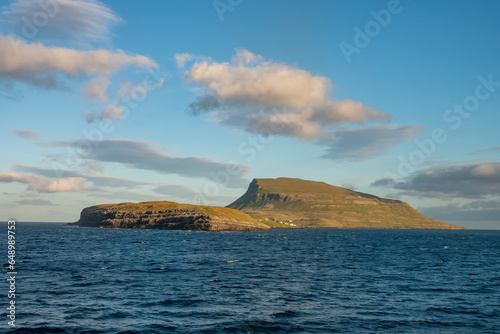 Sailing past Nolsoy Island, Faroe Islands, a self-governing archipelago, part of the Kingdom of Denmark © Luis