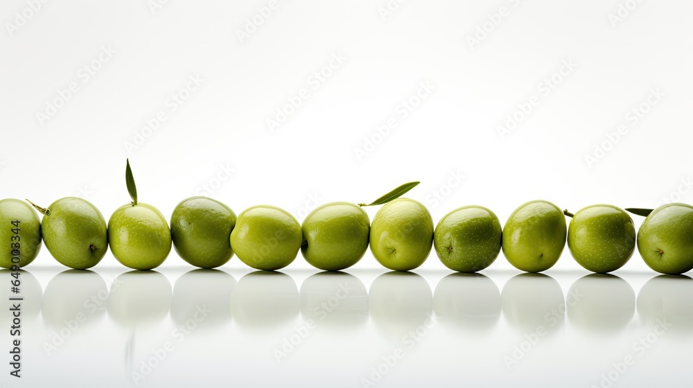 An image of plum-green olives on a white background. An image of plum-green olives on a white background.