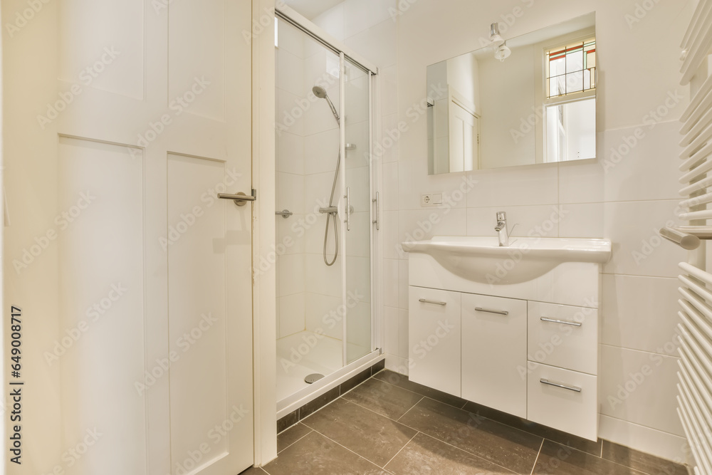 Modern bathroom with shower cabin and sink Modern bathroom with shower cabin and sink