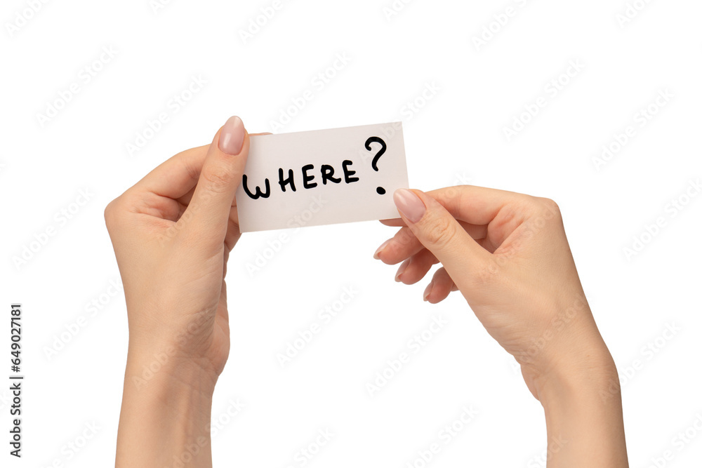 Where text on a card in a woman hand isolated. Where text on a card in a woman hand isolated.