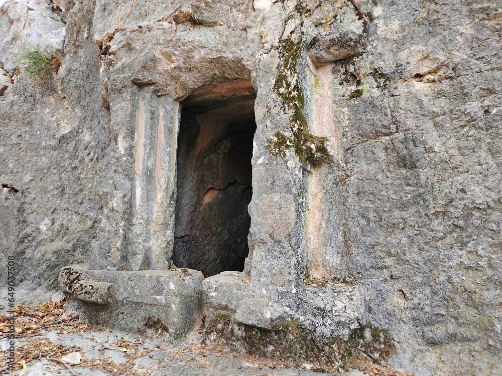 Pinara ruins of an ancient city near Fethiye, Mugla, Türkiye. Lycian tombs, ancient Roman amphitheater and mountains. Pinara ruins of an ancient city near Fethiye, Mugla, Türkiye. Lycian tombs, ancient Roman amphitheater and mountains.