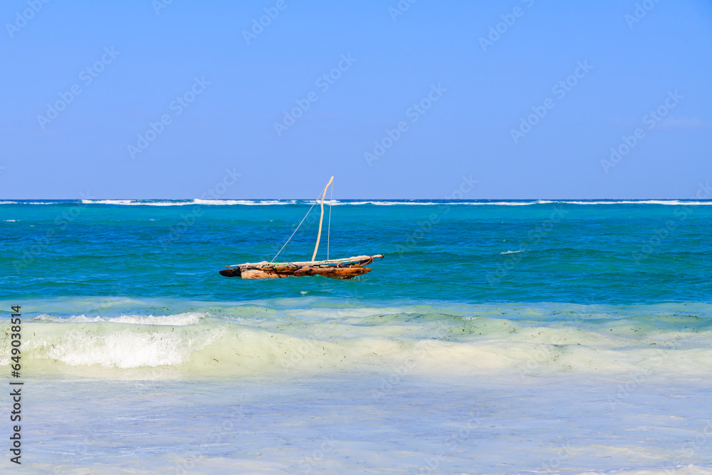 Fototapeta premium Traditional wooden fishing boat dhow at Zanzibar island, Tanzania