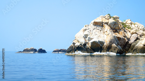 Rocks in the sea. The South China Sea. Swallow Island.