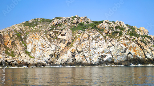 Rocks in the sea. The South China Sea. Swallow Island.