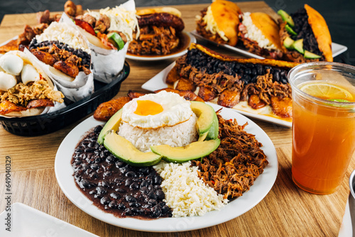 Venezuelan food on a table, arepas, tostones, cachapas, empanadas. typical Venezuelan gastronomy