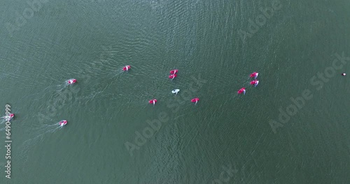 Sailboats compete in a summer race 4k photo