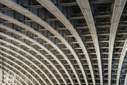 Metal bridge structure, bottom view of arched span
