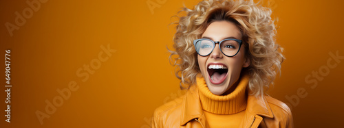 Excited happy and laughing young adult girl wearing sunglasses in front of a colorful background banner - generative AI.