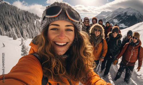 Selfie photo of beautiful happy girl with ski goggles, skiclothing and helmet, skiing with good friends, © hakule