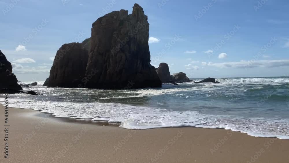 An empty wild sandy beach, Atlantic Ocean seascape, sea waves, beautiful cloudscape, dramatic landscape, travel content, Lisbon, Portugal An empty wild sandy beach, Atlantic Ocean seascape, sea waves, beautiful cloudscape, dramatic landscape, travel content, Lisbon, Portugal