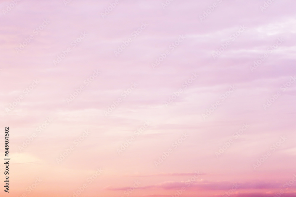 Dreamy purple pink sky background and clouds soft focus, and copy space