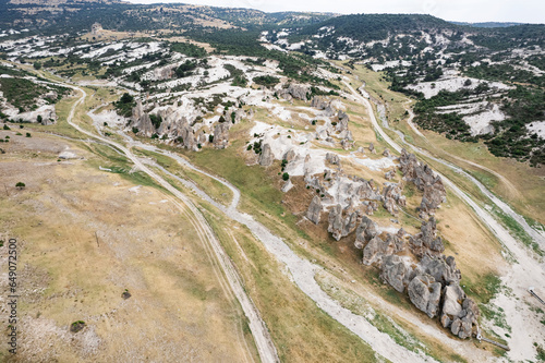 Historical ancient Frig (Phrygia, Gordion) Valley. Tomb (shrine, turbe) and old cemetery. Frig Valley is popular tourist attraction in the Yazilikaya, Afyon - Turkey. photo