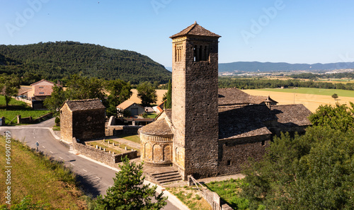 Aerial view of bell tower and apse of the Mozarab Pre-Romanesque or Romanesque Church of San Pedro de Larrede in the Serrablo Region. Aragon. Spain photo