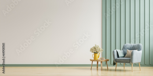 Fototapeta Naklejka Na Ścianę i Meble -  Room interior has green armchair on empty white wall background.