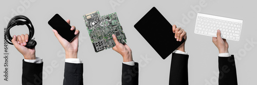 Panoramic banner hand holding electronic waste on isolated background. Eco-business recycle waste policy in corporate responsibility. Reuse, reduce and recycle for sustainability environment. Quaint