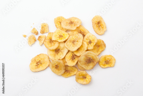 Bilde på lerret Banana chips with broken isolated on white background , top view , flat lay