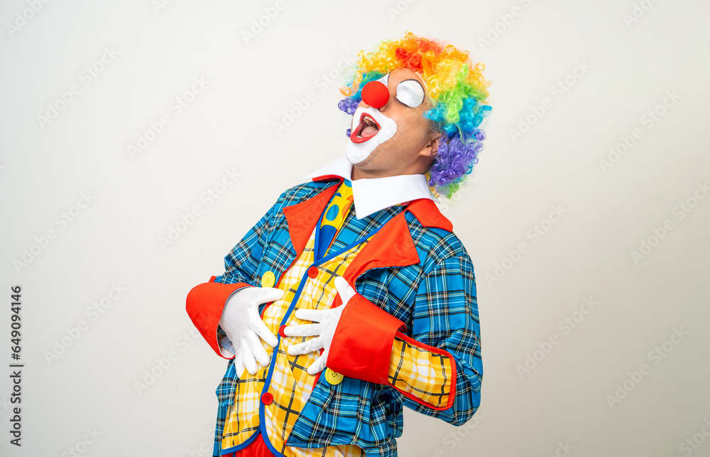 Mr Clown. Portrait of Funny face Clown man in colorful uniform standing variety action. Happy expression male bozo in various pose on isolated background. Mr Clown. Portrait of Funny face Clown man in colorful uniform standing variety action. Happy expression male bozo in various pose on isolated background.