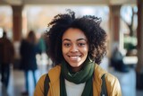 Smiling portrait of a happy female african american student on a college campus