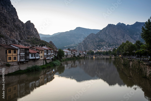 Amasya,TURKEY old riverside Turkish(ottoman) city buildings and its reflection on water,sunny summer day.Amasya is city of princes of ottoman. ottoman Princes were educated in Amasya
