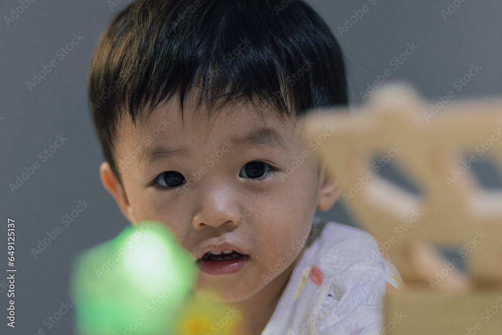 Close-up Portrait image of Happy 1-2 years old Asian Chinese child on happy mode Close-up Portrait image of Happy 1-2 years old Asian Chinese child on happy mode