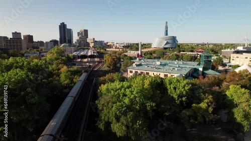 Aerial clip of Via Rail train entering the Forks in Winnipeg, MB photo