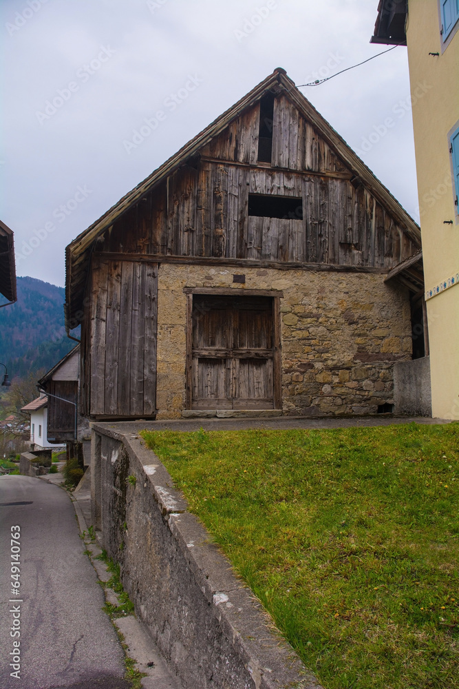 An old and now disused farming building in village of Ovaro in Udine Province, Friuli-Venezia Giulia, north east Italy