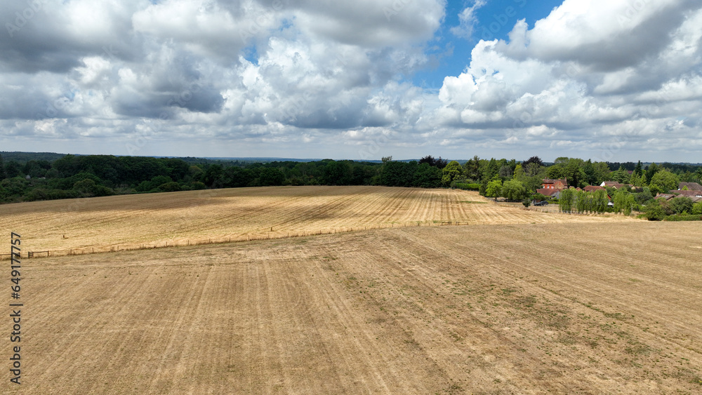 Aerial view of dry brown grass field