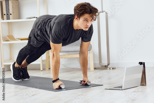 gray man home indoor activity lifestyle training sport health dumbbells yoga