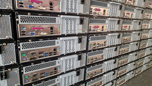 Stack of computers showing there plugs and ports