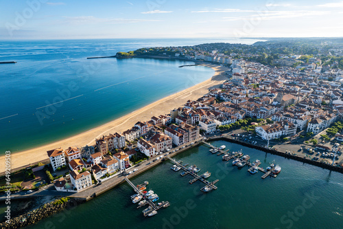 Aerial fly over above the french village of  Saint-Jean-de-Luz during summer	 photo