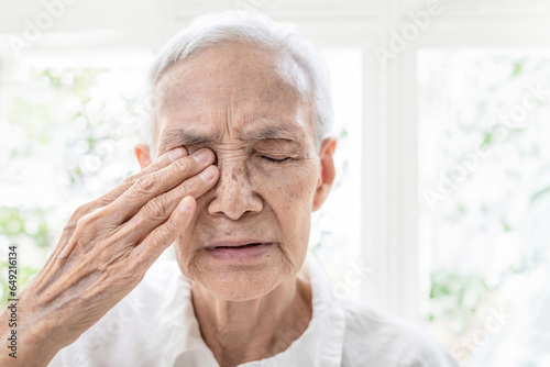 Old elderly suffer from age-related macular degeneration,optic nerve damage,Glaucoma symptoms,painful around the eye area,problem of pressure within the eyeball,vision disturbances or loss of sight photo