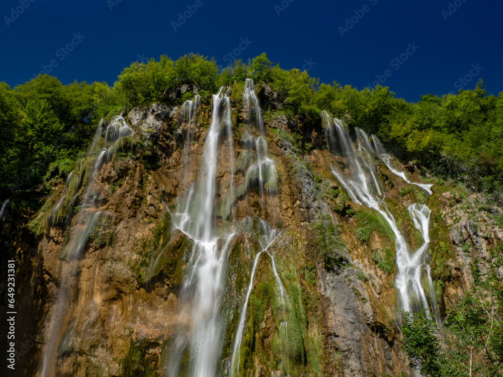 Fototapeta premium Summer view of water lakes and beautiful waterfalls in Plitvice Lakes National Park, Croatia