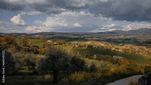 Green fields and hills with small villages in the Lazio region.