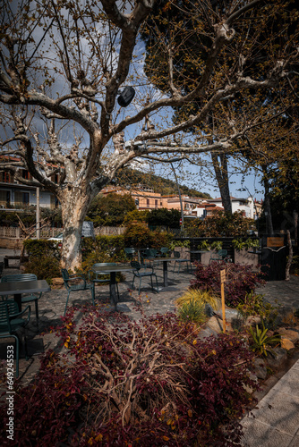 A picturesque cafe on the shores of Lake Bracciano. Italian region Lazio! Bright spring colors. inscription - welcome table