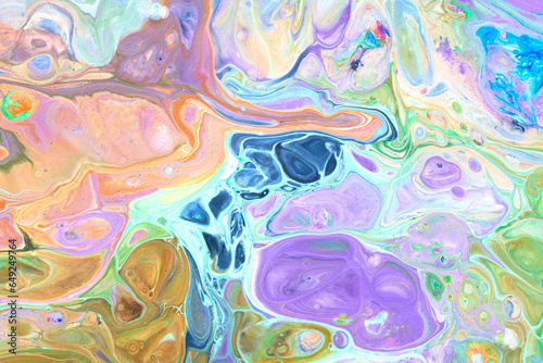 Exclusive beautiful pattern, abstract fluid art background. Flow of blending multicolored paints mixing together. Blots and streaks of ink texture for print and design.