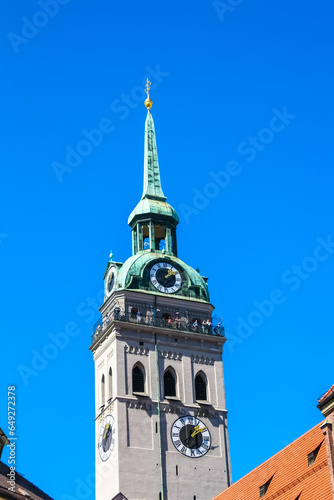 MUNICH, GERMANY - Detail of the tower of the Kirchturms St. Peter's on a sunny summer's day photo