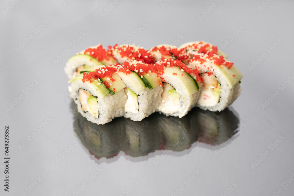 Sushi rolls on white background with reflection, space for text. Japanese food Sushi rolls on white background with reflection, space for text. Japanese food