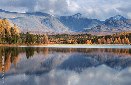 Picturesque lake in the mountains of Altai, autumn day
