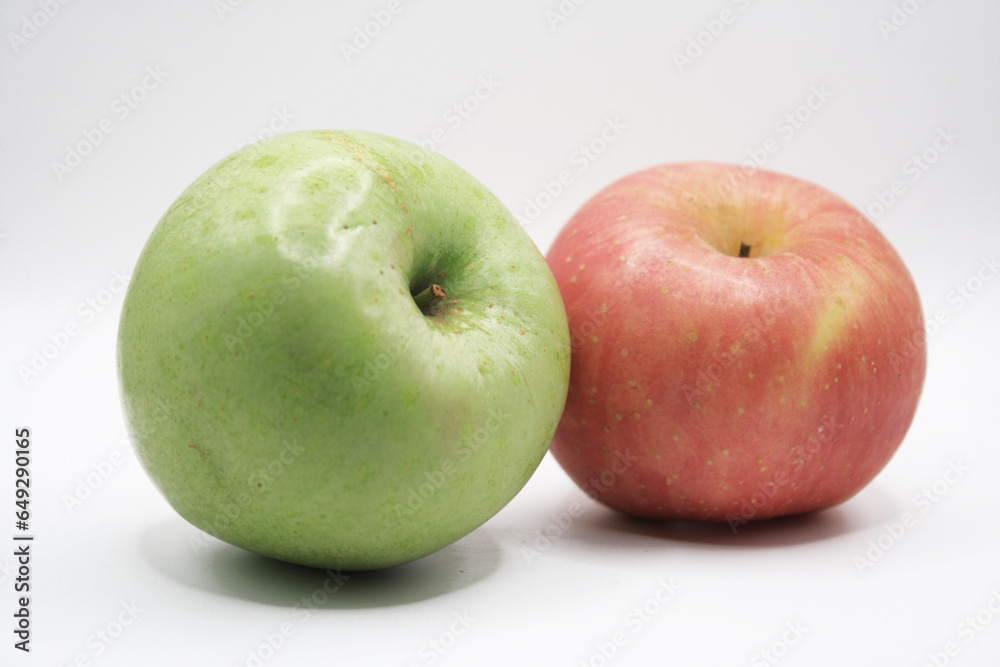 red and green apples on white