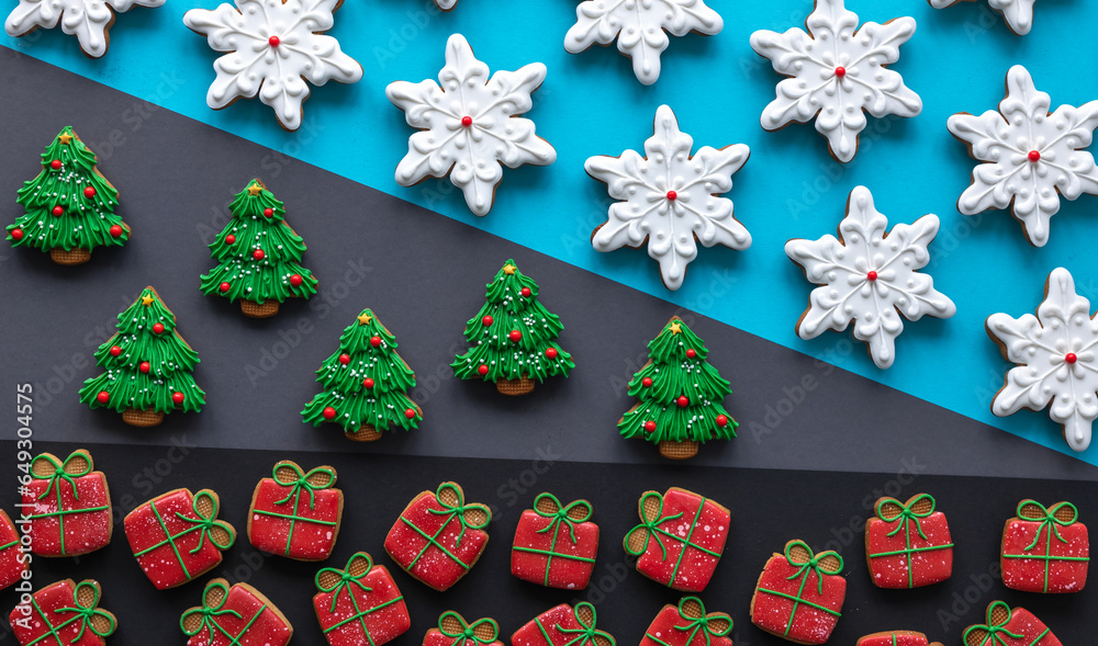 Christmas background with festive gingerbread covered with icing, flat lay.