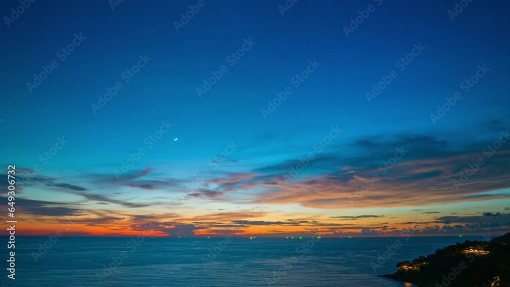 .aerial hyperlapse view stunning sunset at the sea in twilight. .Scene of colorful red light trough in the dark sunset sky..Gradient color. Sky texture, abstract nature background. .aerial hyperlapse view stunning sunset at the sea in twilight. .Scene of colorful red light trough in the dark sunset sky..Gradient color. Sky texture, abstract nature background.