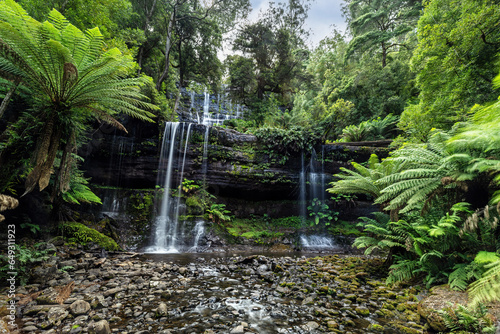 Russell Falls, a tiered–cascade waterfall on the Russell Falls Creek, located in the Central Highlands region of Tasmania, Australia.