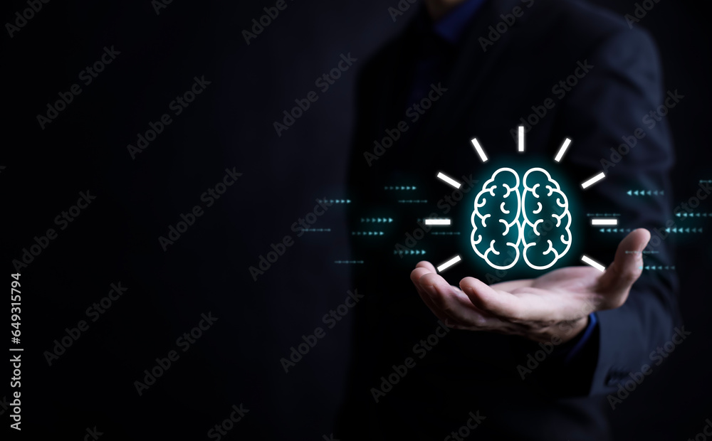 Businessman presenting brain with E-learning education and graduation concept, study knowledge to creative thinking ideas and problem-solving solutions,  education course degree certificate