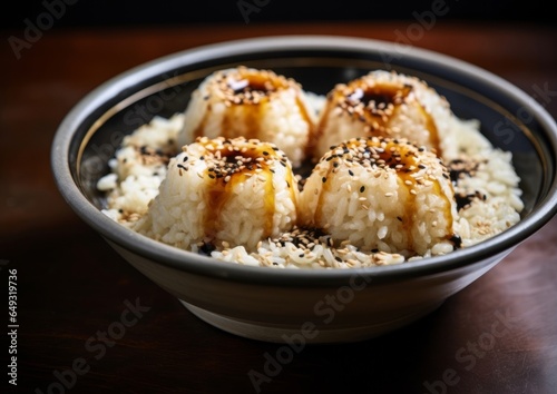 bowl of sticky rice dumplings soaked in a sweet syrup, garnished with sesame seeds and chopped scallions