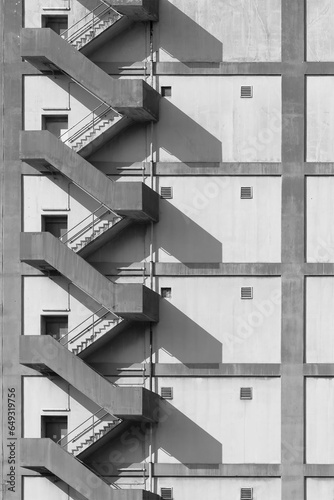 Staircase on exterior of high rise warehouse. Building abstract background