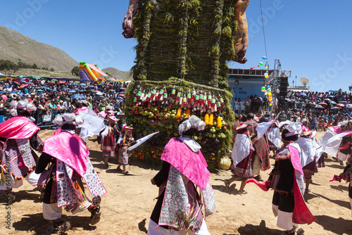 Pujillay festival in the town of Tarabuco, Bolivia. People are dancing around the pukara photo
