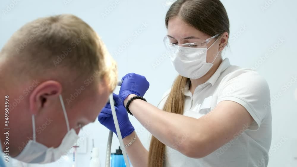 latest technology cleaning and whitening teeth nurse and doctor